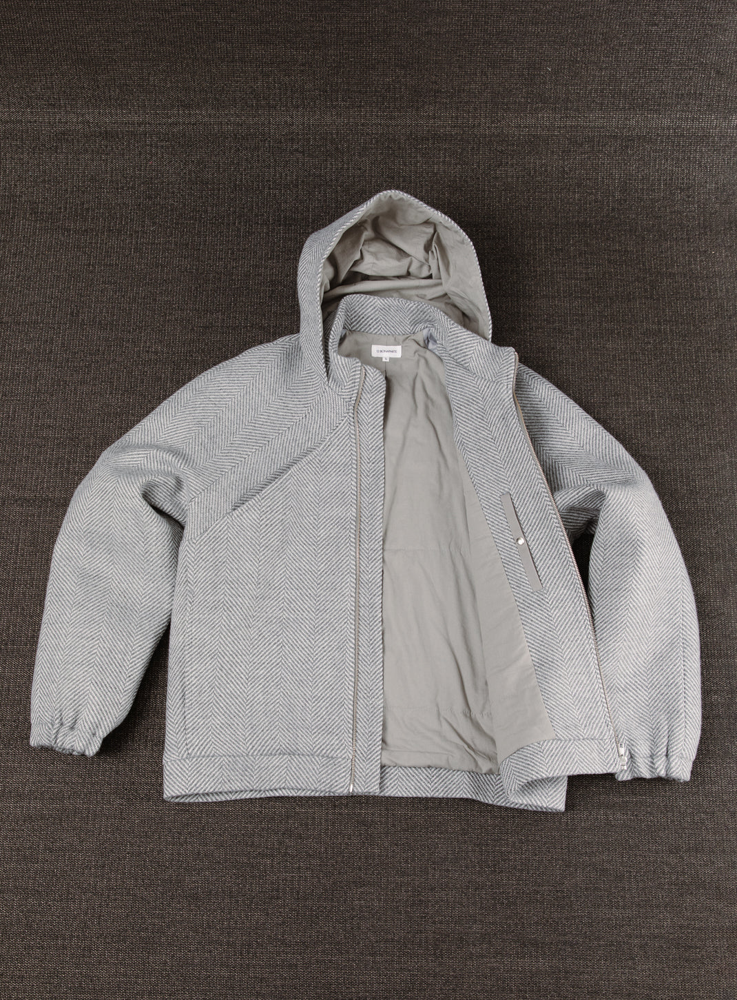 X Collar Puffer Jacket in Light Grey Herringbone Wool