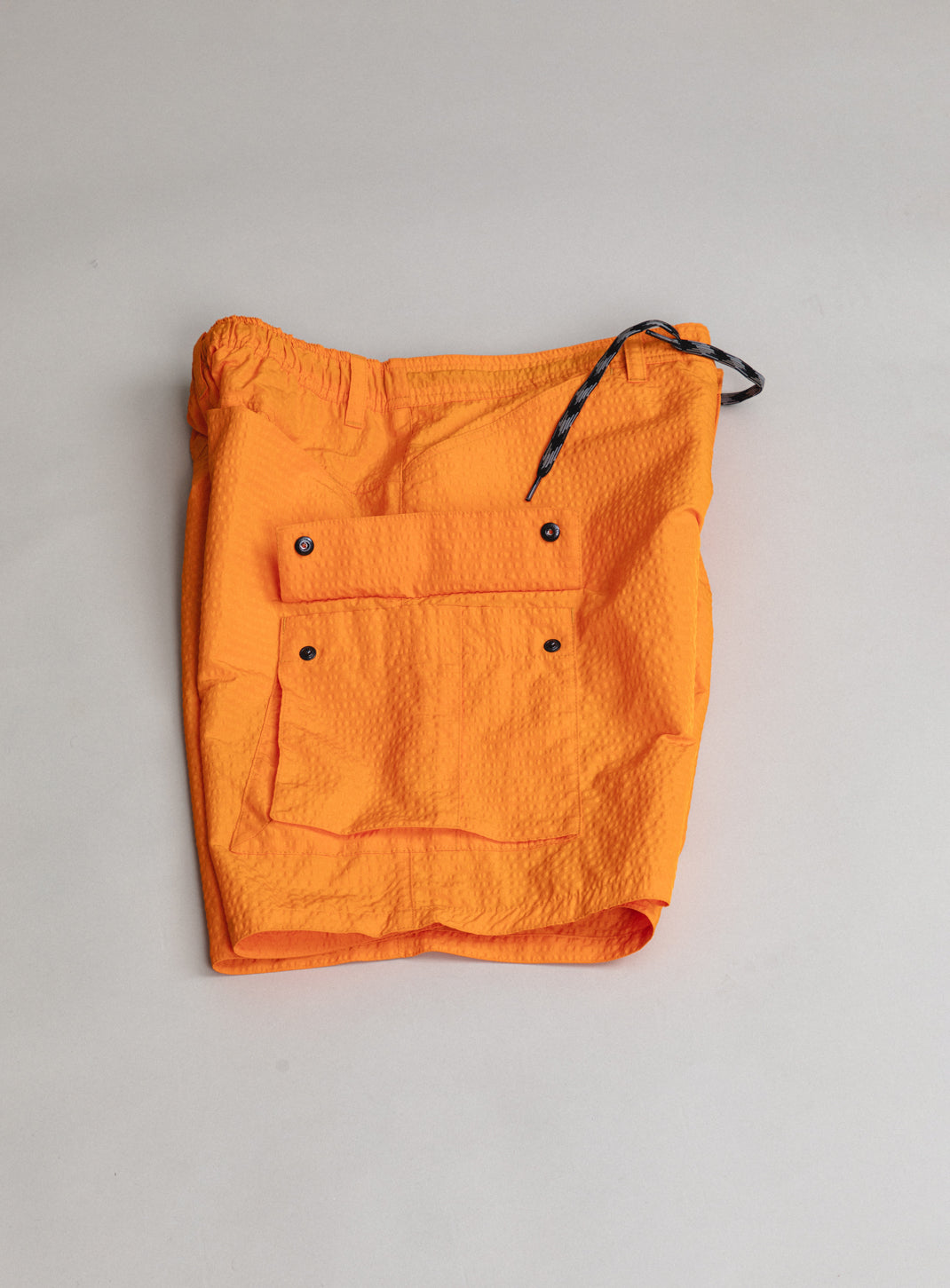 Short Running à Poche Cargo en Tissu Technique Gaufré Orange