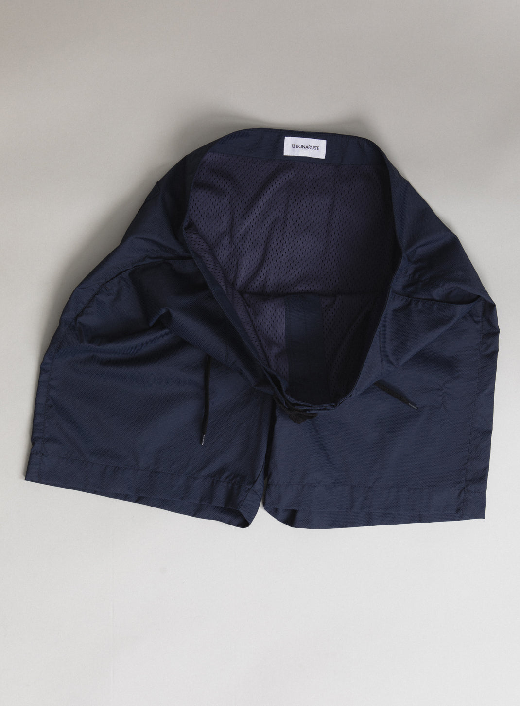 Short de bain de surf bleu marine en Ecocare Tactel