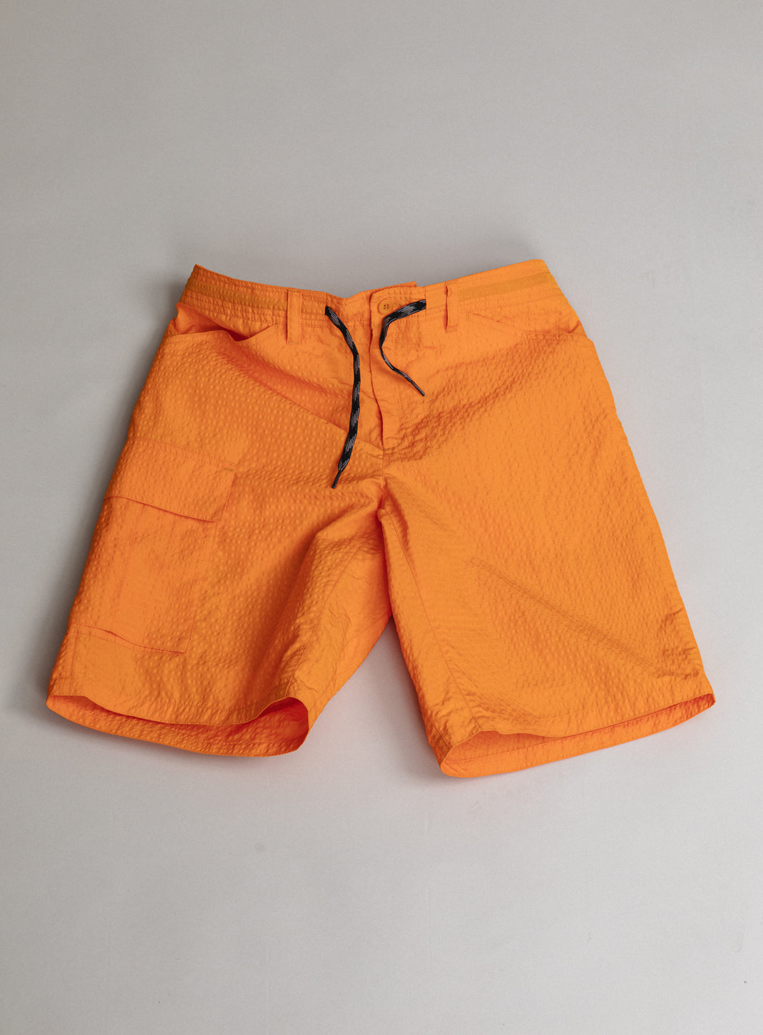 Running Shorts with Cargo Pocket in Orange Embossed Technical Fabric