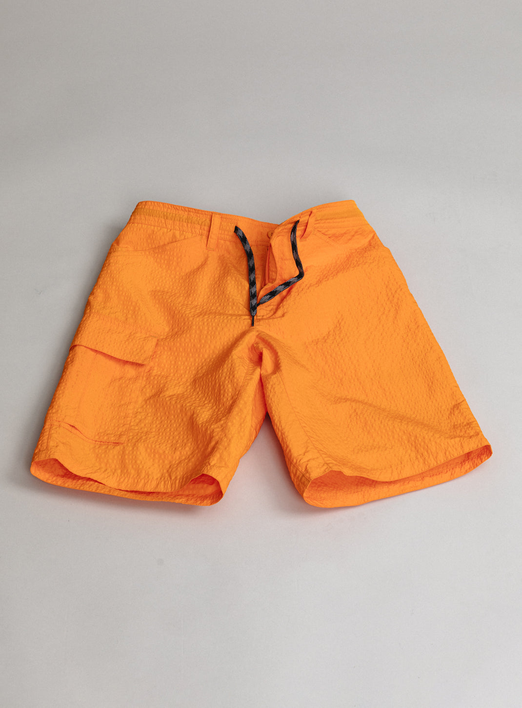 Running Shorts with Cargo Pocket in Orange Embossed Technical Fabric