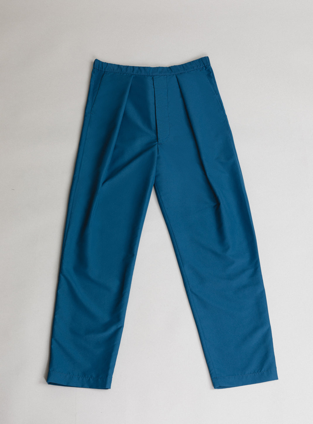 Elastic Waist Pants with Deep Pleats in Petrol Blue Technical Serge