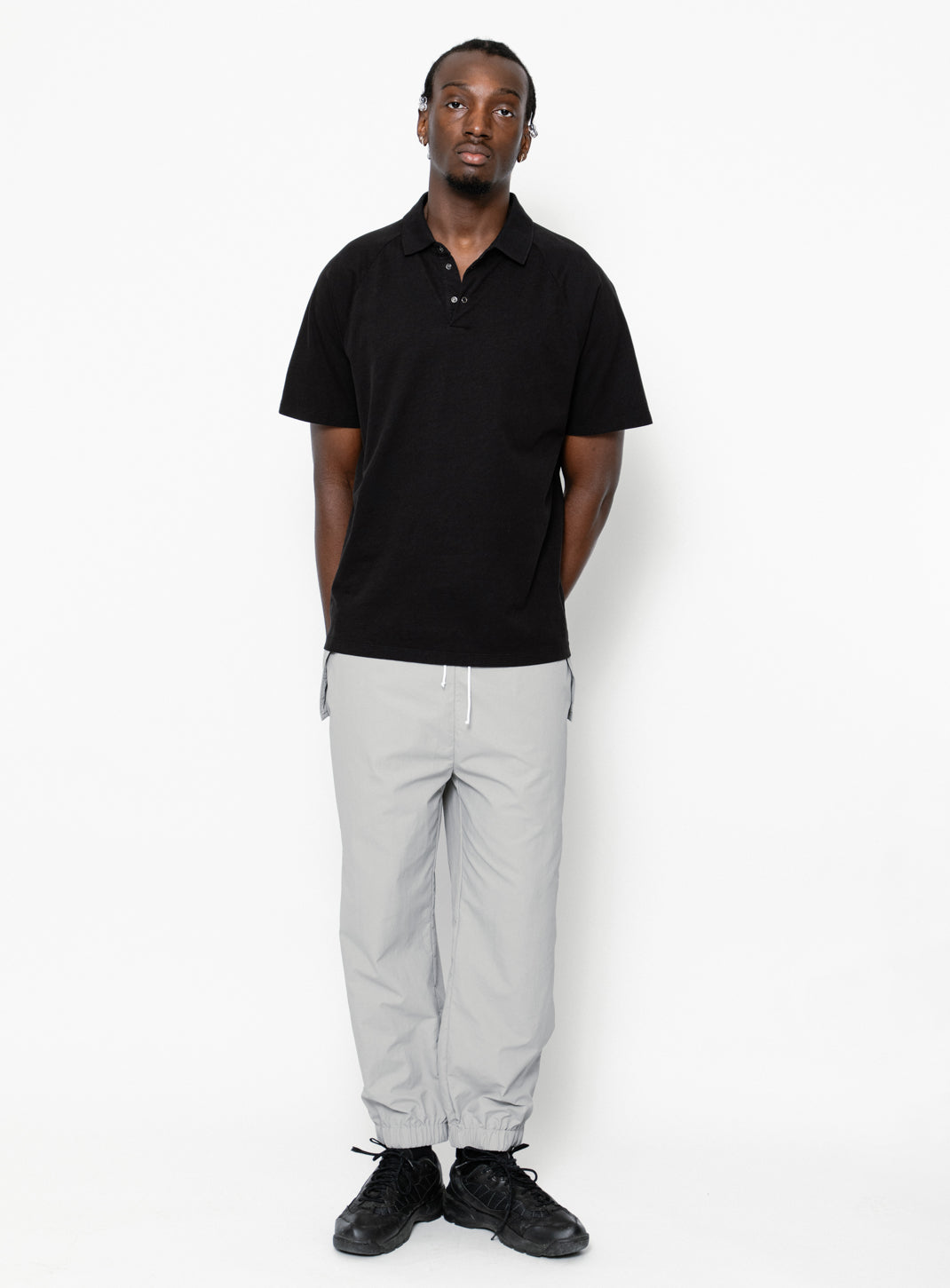 Short Raglan Sleeve Poloshirt in Black Washed Cotton