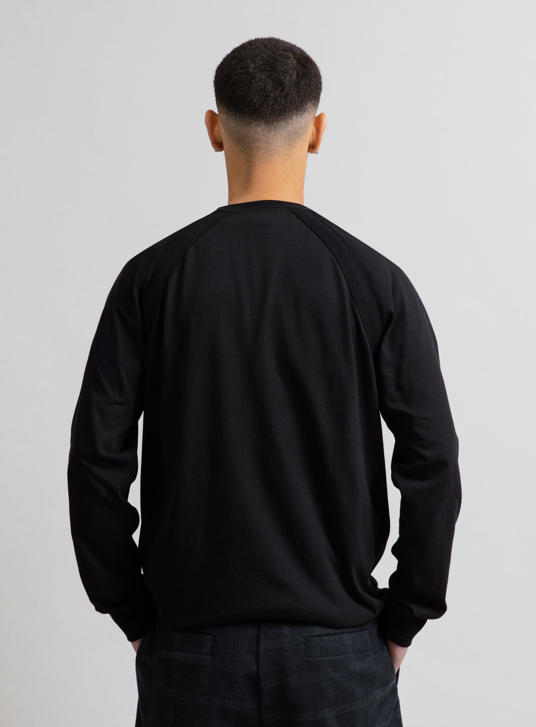 Sweatshirt with Raglan Yokes in Black Piqué Fleece