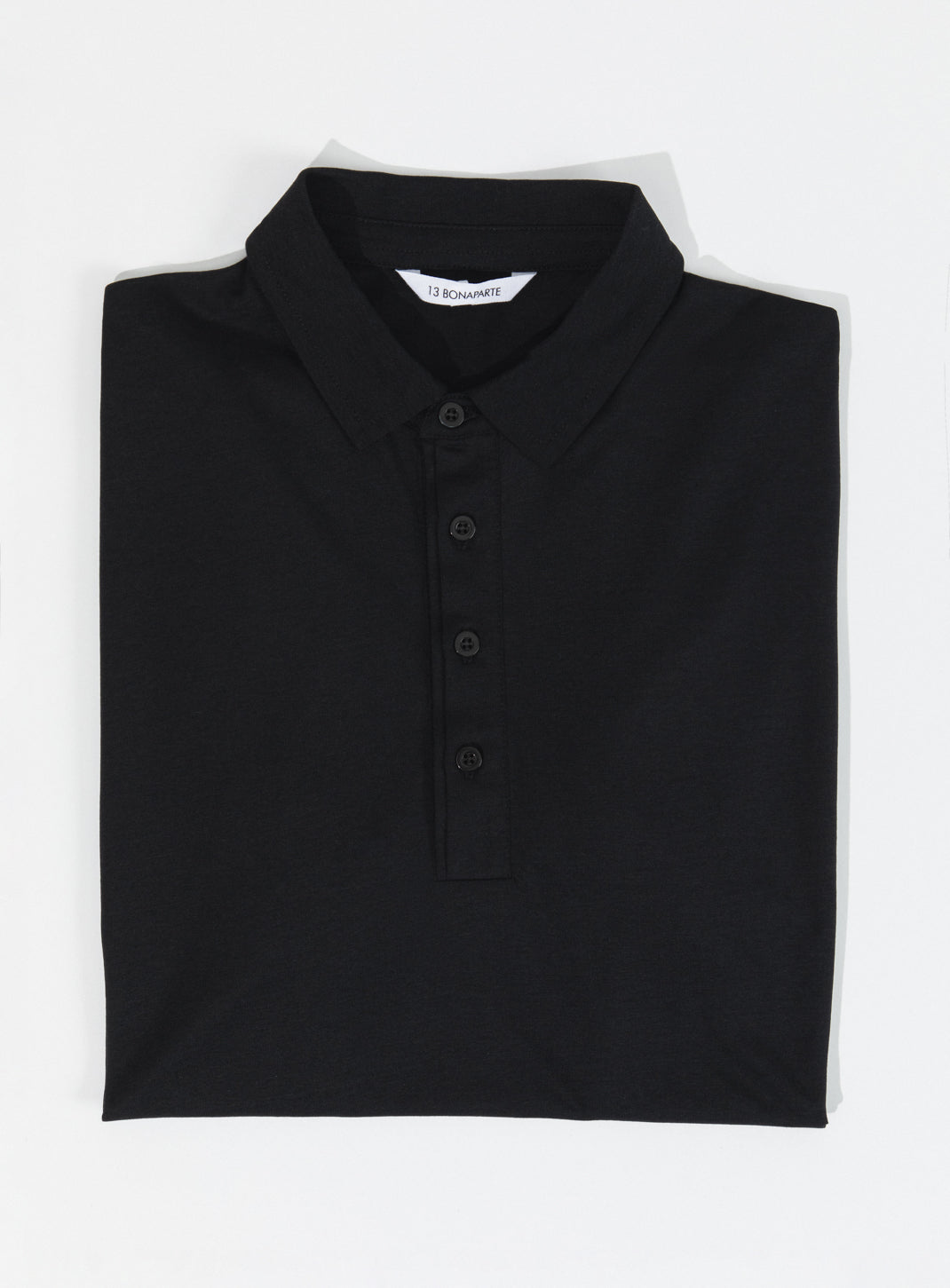 Pleated Tab Short Sleeve Poloshirt in Black Eucalyptus & Cotton
