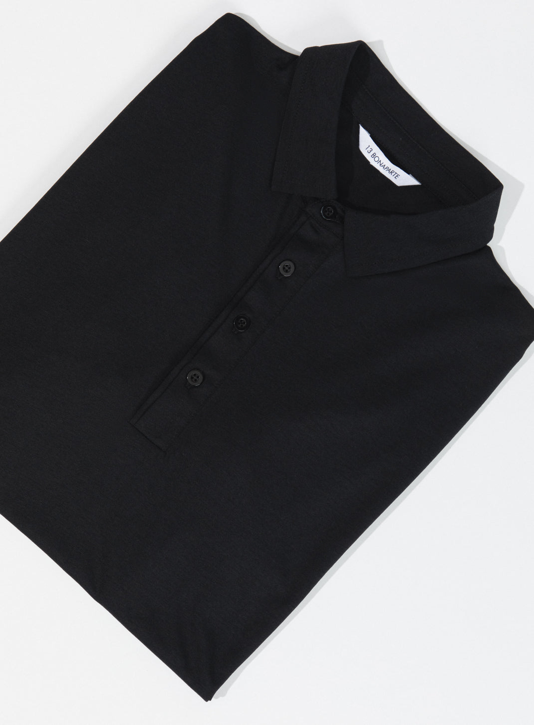 Pleated Tab Short Sleeve Poloshirt in Black Eucalyptus & Cotton