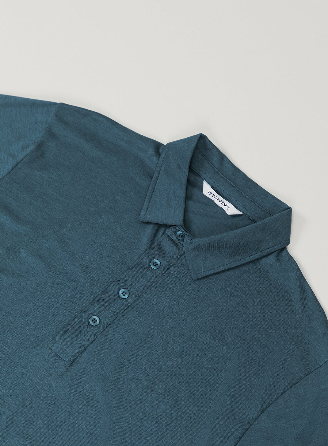 Pleated Tab Short Sleeve Poloshirt in Petrol Blue Eucalyptus & Cotton