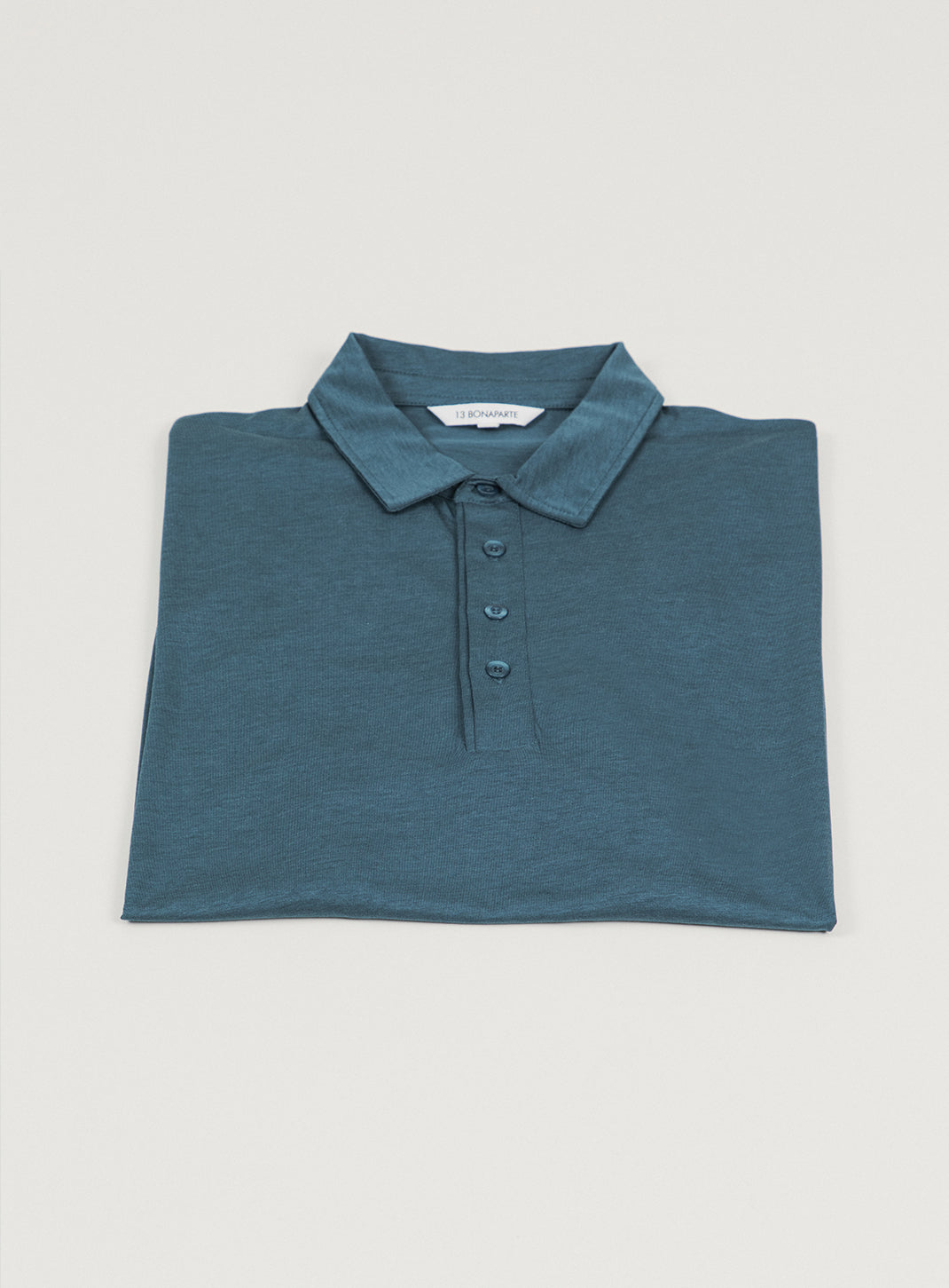 Pleated Tab Short Sleeve Poloshirt in Petrol Blue Eucalyptus & Cotton