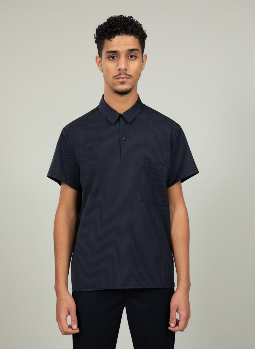 Short Sleeve Poloshirt with Chest Pocket in Navy Fine Stripe Gabardine